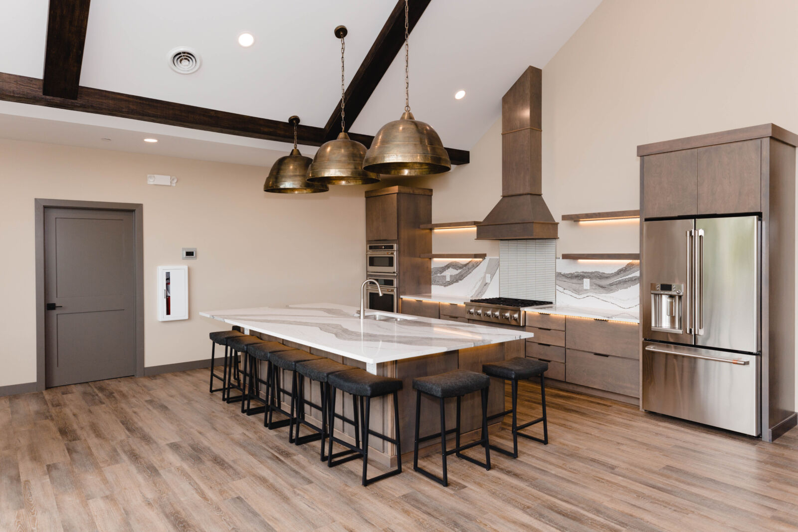Siesta Hills Clubhouse Gourmet Kitchen and Island Seating Mankato Minnesota Siesta Hills clubhouse gourmet kitchen with large island and seating in Mankato Minnesota