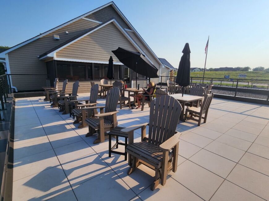 Siesta Hills clubhouse balcony and patio architecture overlooking community grounds in Mankato Minnesota