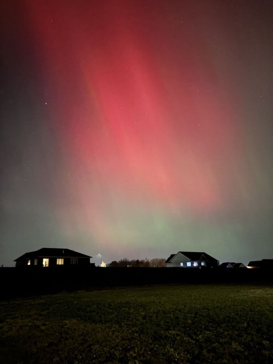 Northern lights over Siesta Hills community in Mankato Minnesota at night