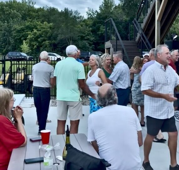 Residents gathering for a community event with live music at Siesta Hills in Mankato Minnesota