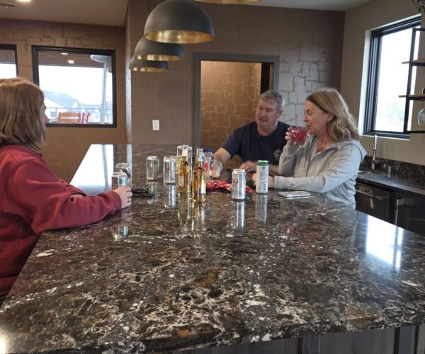 Residents enjoying happy hour at the Siesta Hills community clubhouse in Mankato Minnesota
